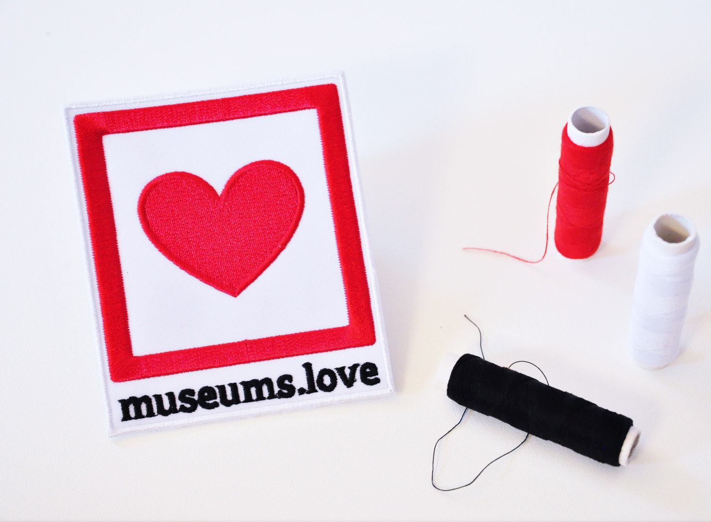 museum lover's sew-on patch with red heart in frame